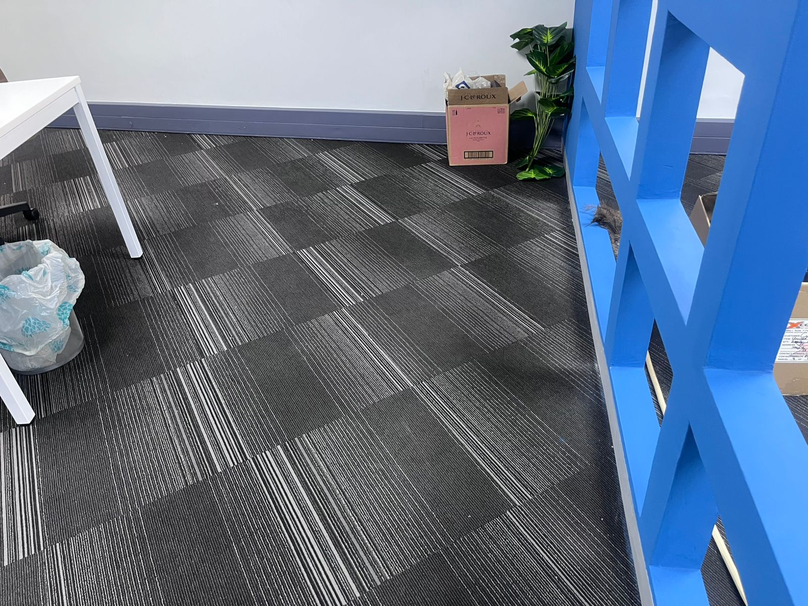 Office room showing blue storage lockers